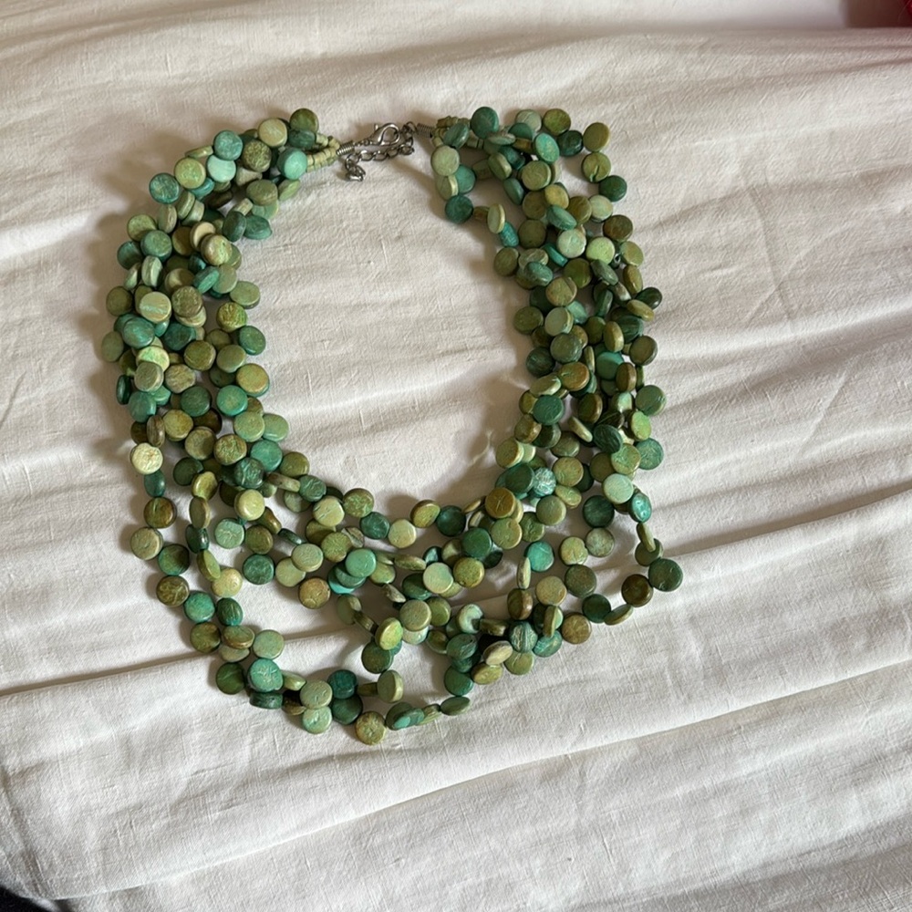 Green beaded necklace bought from Spain